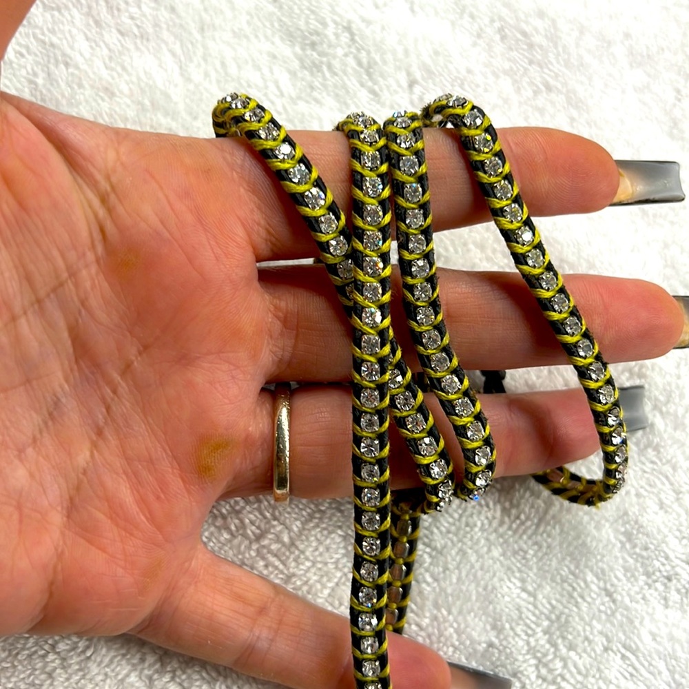 ChanLu bracelet wrap around black and lime yellow. One stone missing